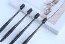 Luxury hotels sell black translucent toothbrushes