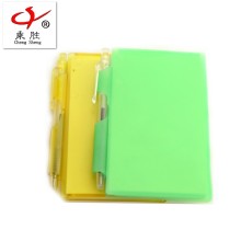 small notepad with custom colored plastic box and transparent pen
