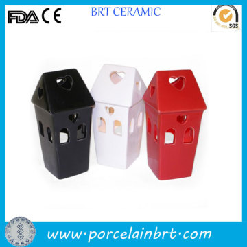 House shaped ceramic tea light holder