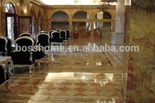 Gold marble floor tiles and wall panel