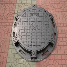 DAT group cast manhole cover