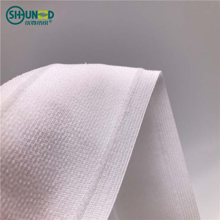 China wholesale hot sell 100% polyester stretch waist band interlining waistband high elastic adhesive dot fuse for Jeans pant