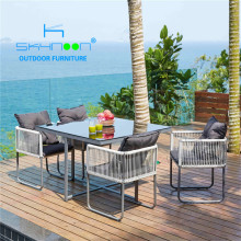 Wholesale Space-Saving 4 Seater Rattan Cube Garden Furniture Set for Outdoor Dining
