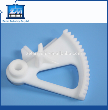 Injection molded assembly nozzle plastic components