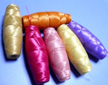 Thread of (cocoon) Bobbins on Shiffli Embroidery Machine