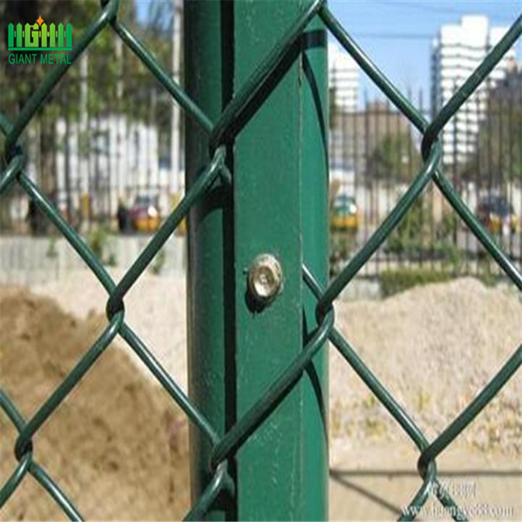 Galvanized chain link fence top barbed wire