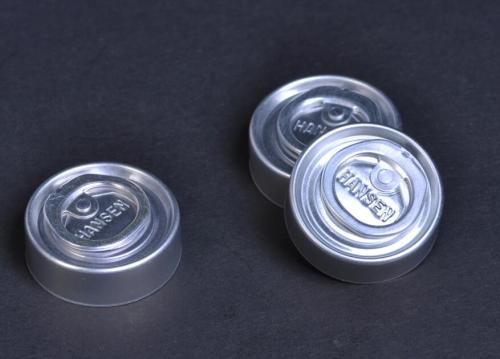 Tear-off cap for glass infusion bottle