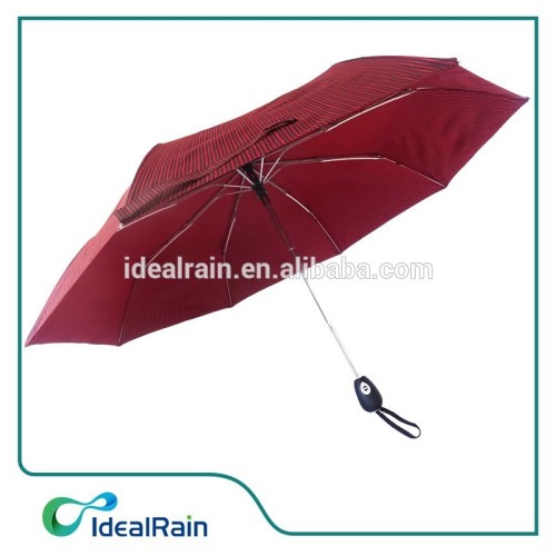 red and black striated windproof travel umbrella