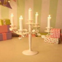 Wrought iron white roses five candlesticks