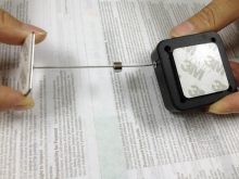 Anti-shoplifting Recoilers