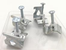 Ceiling clip for powder actuated tools