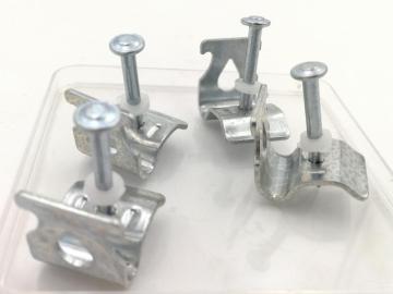 Ceiling clip for powder actuated tools