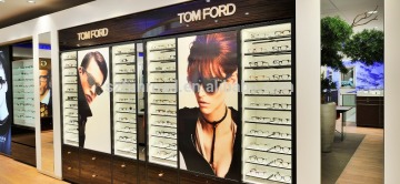 Led lighted retail store furnitures for optical store design with LED posters and illuminated Logos