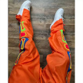 Оранжевые мужские брюки бега