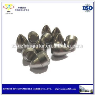 Grinding tungsten carbide buttons