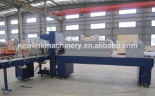 Plastic bottle hot shrink wrapping machine