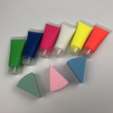 Intense pink neon face paint glow night