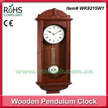 Decorated antique pendulum wall clock