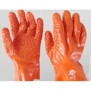 Guantes de pellet naranja para protección contra el frío.