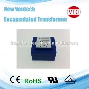 Low frequency encapsulated PCB mount transformer