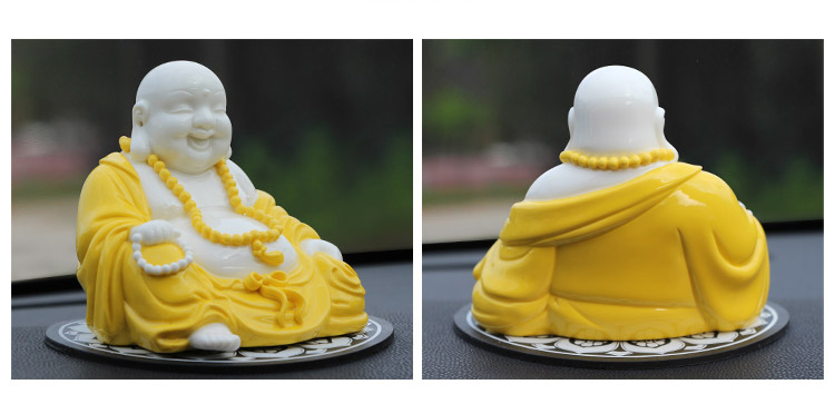 car  buddha figurine