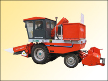 Tractor mounted corn harvester