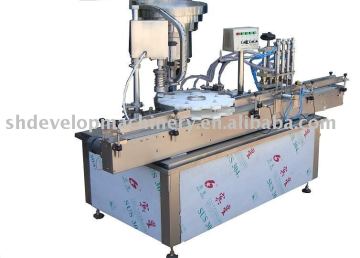 Liquid filling and capping machine inline