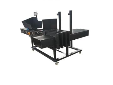 Clothes and textile bagging machine
