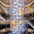 Large glass chandelier in hotel lobby