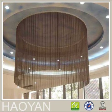 luxurious and fashionable string curtains hanging around the light in the hall