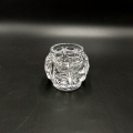 Mały szklany świecznik w kształcie kulki na tealighty