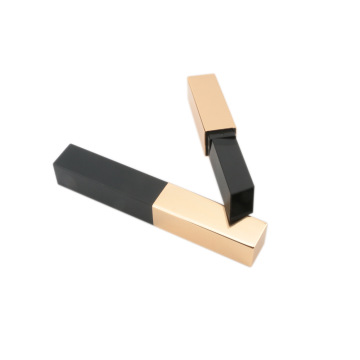 Square black and golden lipstick tube