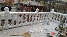 white natural stone baluster railing