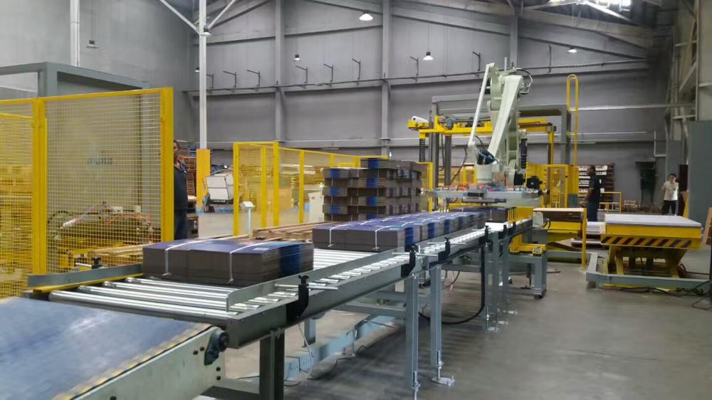 Automatic pallet dispenser for wrapper and packing system