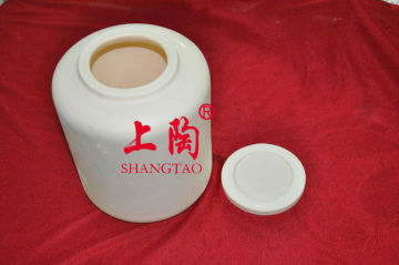 Alumina fortified porcelain milling jar
