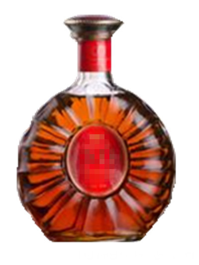 Transparent glass bottle of whiskey