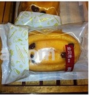 Automatic cake packaging machine