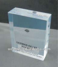 Clear lucite paperweight block with coal inside