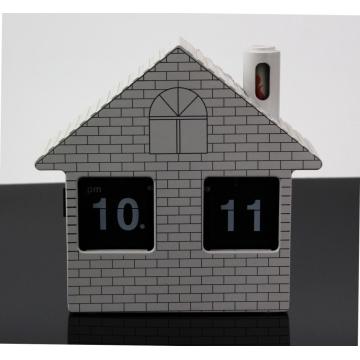 Casa modo Flip Clock na mesa