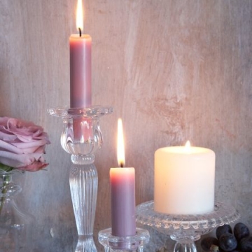 shrink wraps wax white candle to african