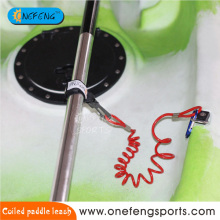 Red coiled paddle leash