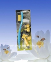 car wash with brush and hose nozzle