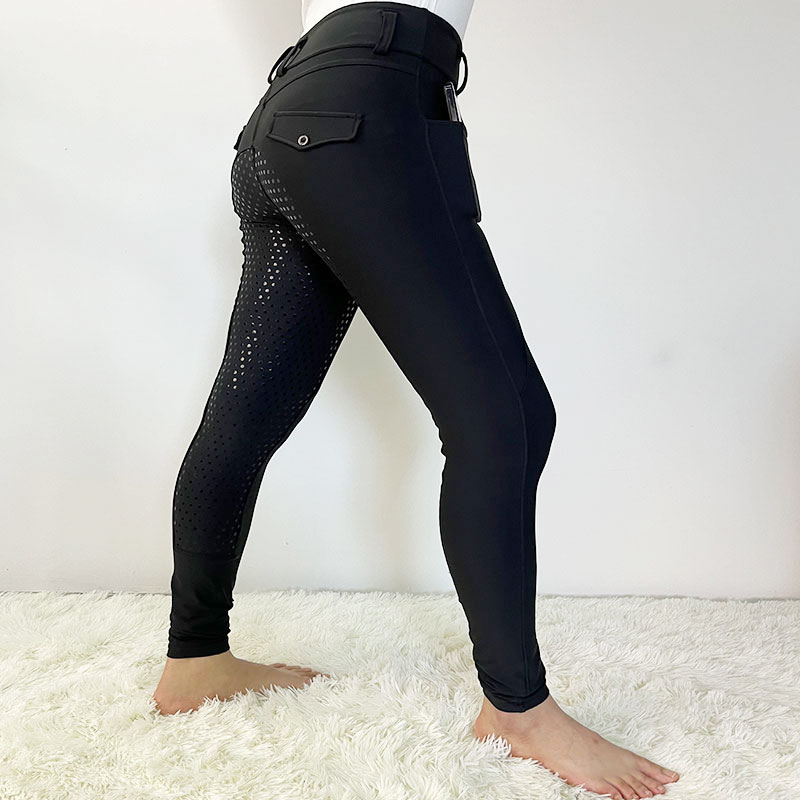 Pantaloni equestri di donne nere premium per lo sport