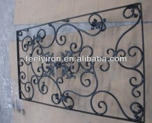 Forged ornamental iron door insert
