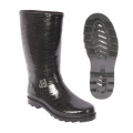 Botte en caoutchouc imperméable noire avec imprimé crocodile