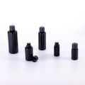 Black glass oil bottle with tamper evident cap