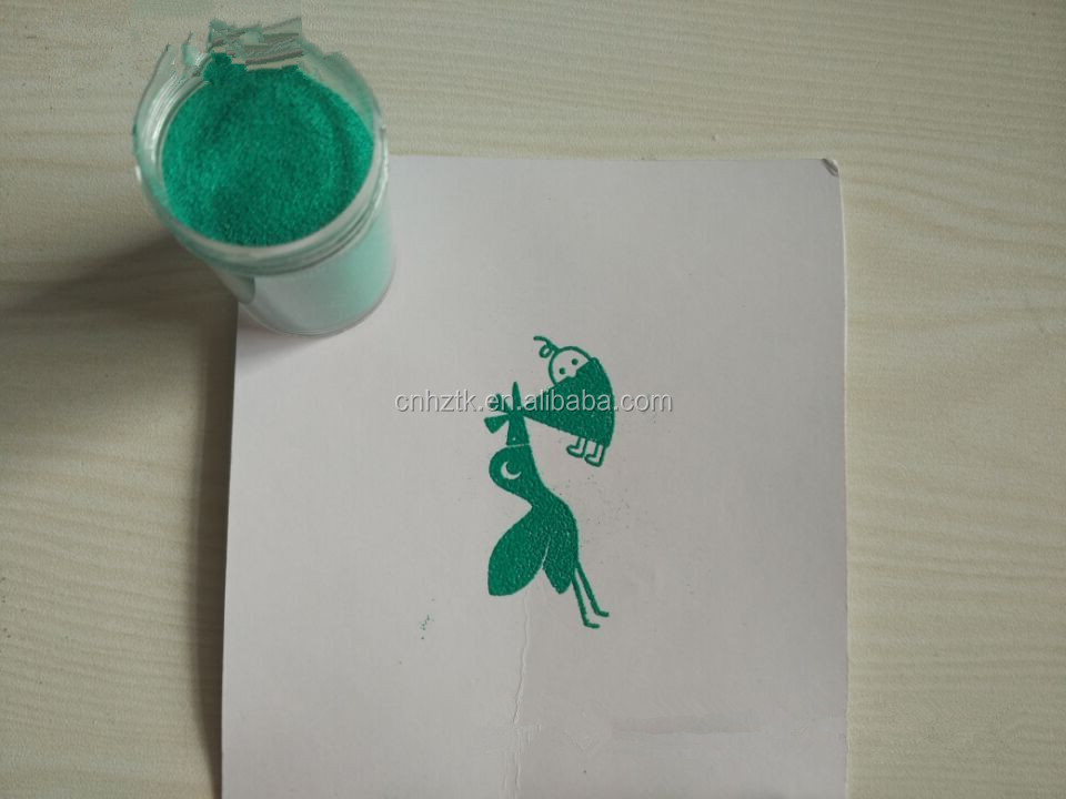 Heat colorful embossing powder for card scrap booking