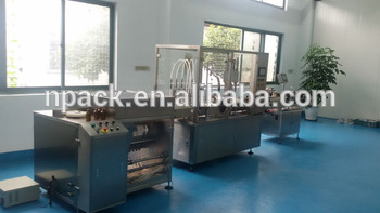 Auto massage oil filling and capping machine