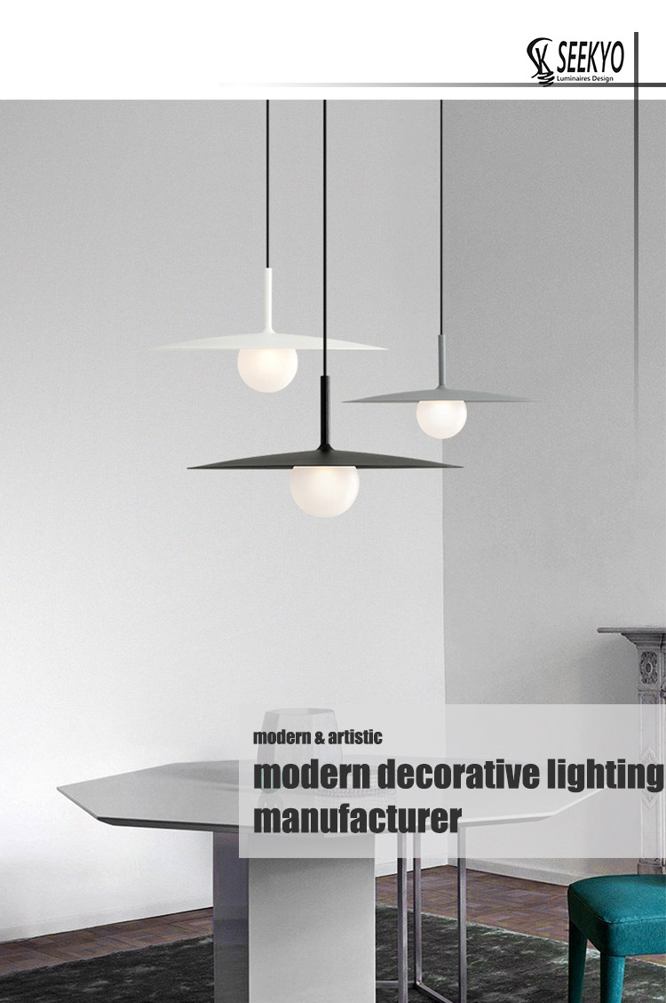 The disc lamp shade glass ball pendant lamp is a stylish and modern lighting option for any space