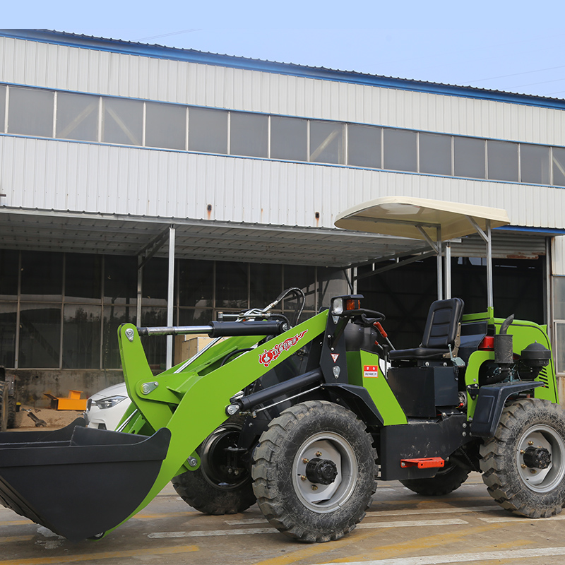 Mini traktor loader depan backhoe